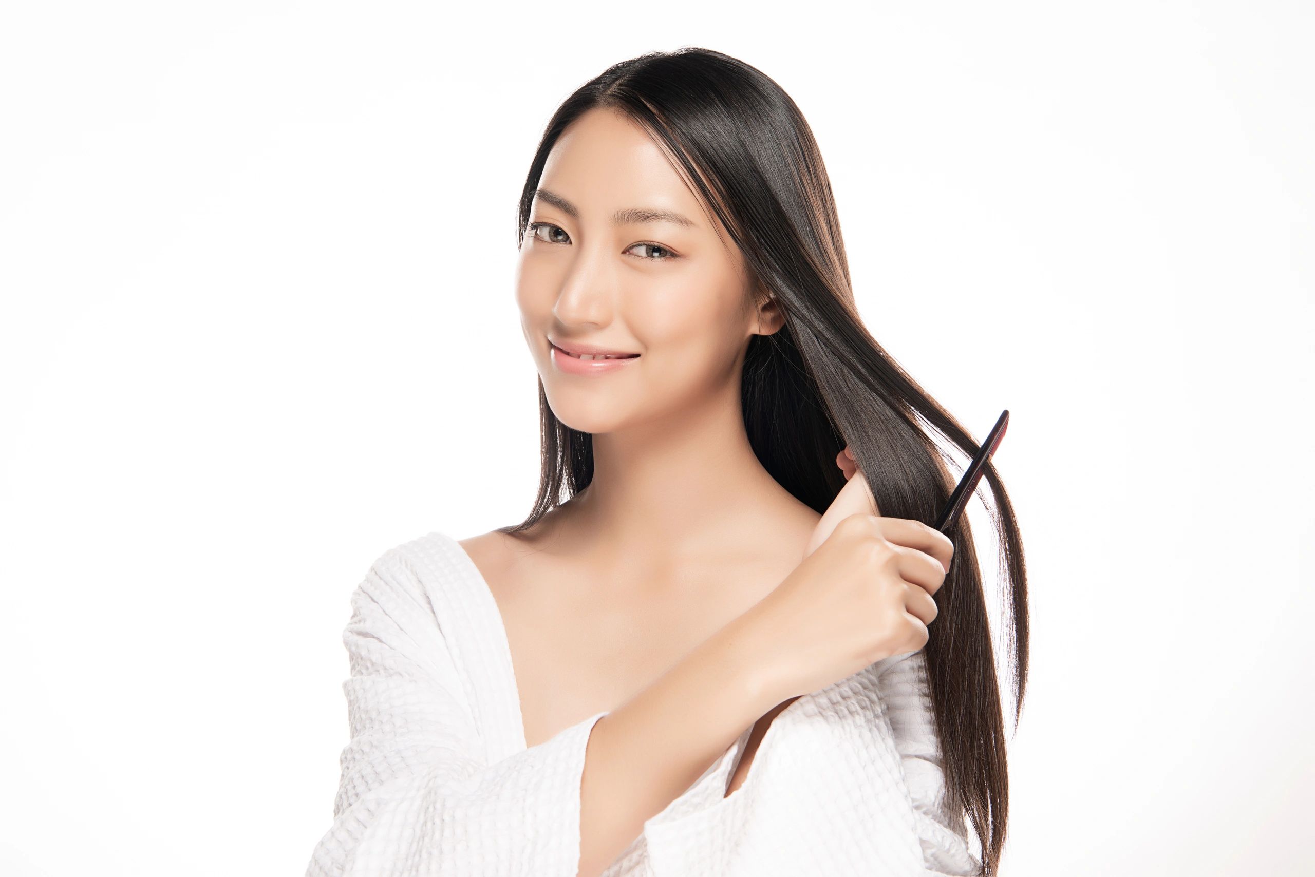 Asian woman brushing hair tutorial